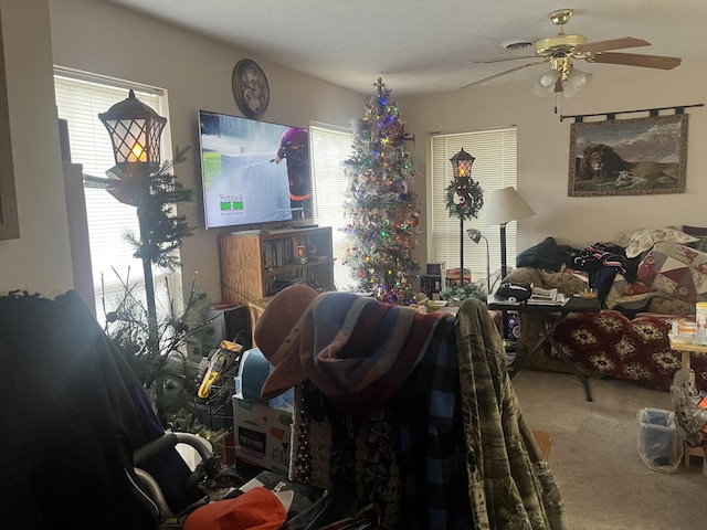 interior space featuring ceiling fan