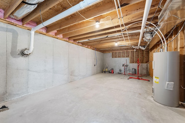 basement featuring electric water heater