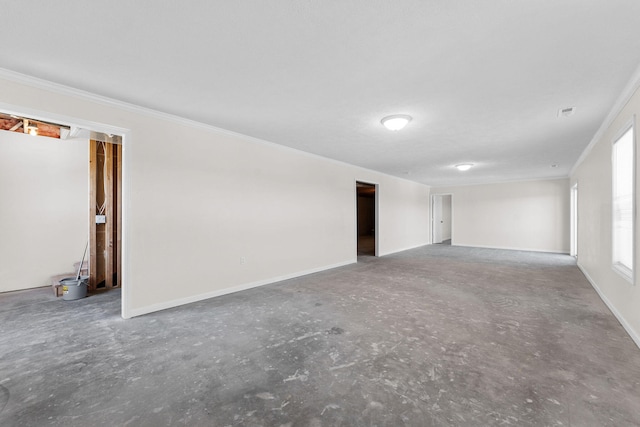 spare room with ornamental molding