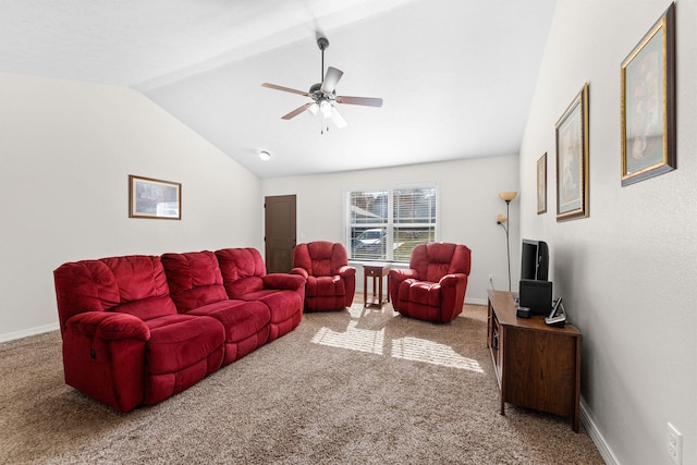 living room with ceiling fan, carpet floors, and vaulted ceiling