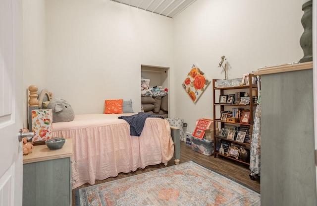 bedroom with hardwood / wood-style flooring