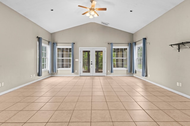 unfurnished living room featuring high vaulted ceiling, ceiling fan, french doors, and light tile patterned floors