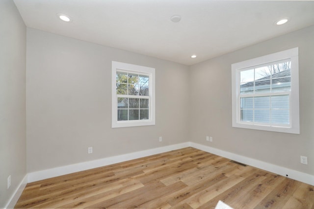 empty room featuring light hardwood / wood-style floors