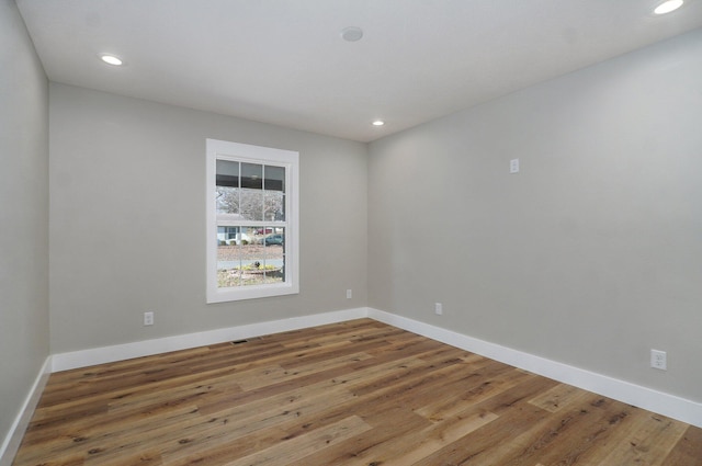 1960 E Meadow Dr, Springfield, MO 65804 - empty room with recessed lighting and wood finished floors