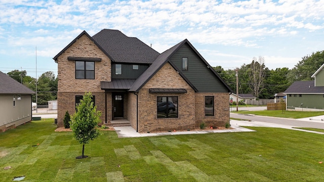 view of front facade with a front lawn