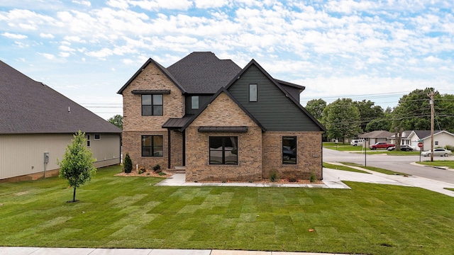 view of front of home with a front yard