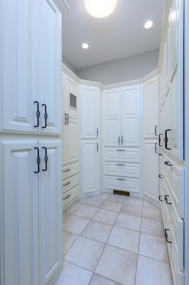 mudroom with light tile patterned flooring