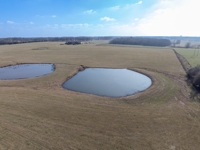 view of pool with a rural view