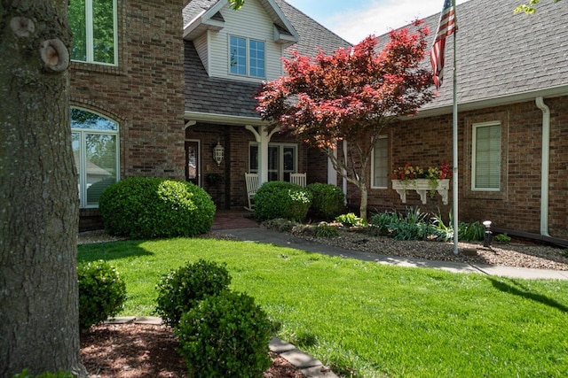 exterior space featuring a front lawn