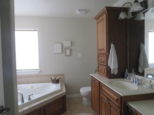 bathroom with a tub to relax in, tile patterned floors, toilet, and vanity