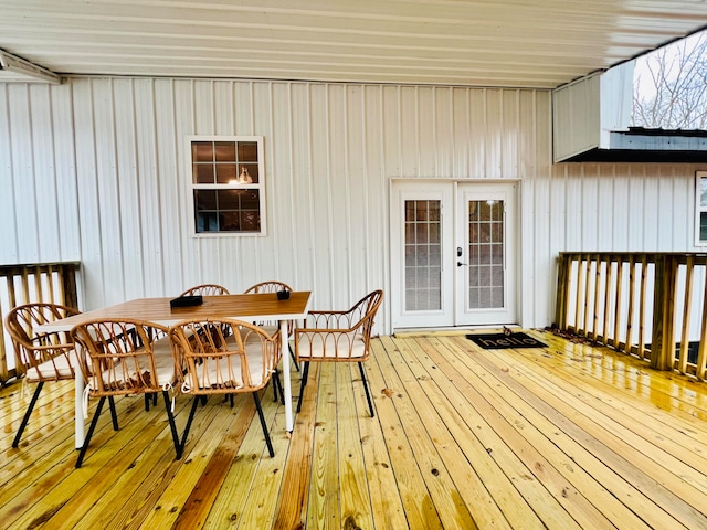 deck featuring french doors and outdoor dining area