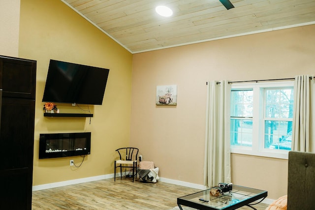 living area featuring light wood-style floors, ornamental molding, vaulted ceiling, wooden ceiling, and baseboards