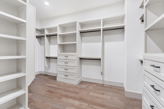 spacious closet with light wood-type flooring