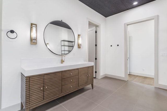 bathroom featuring tile patterned floors and vanity