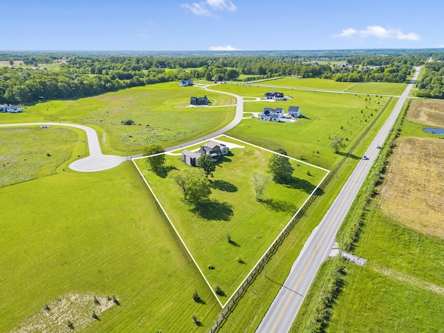 birds eye view of property featuring a rural view