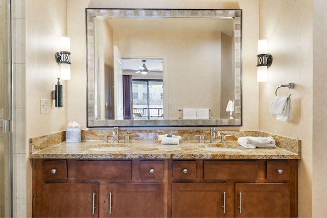 bathroom featuring ceiling fan and vanity