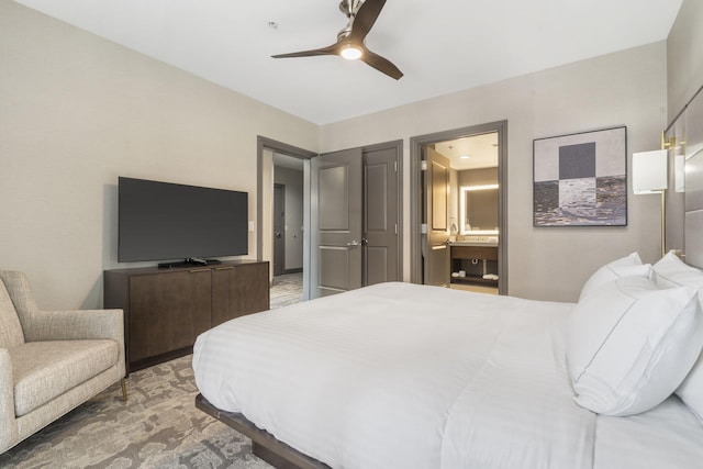 bedroom featuring ceiling fan, carpet floors, and connected bathroom