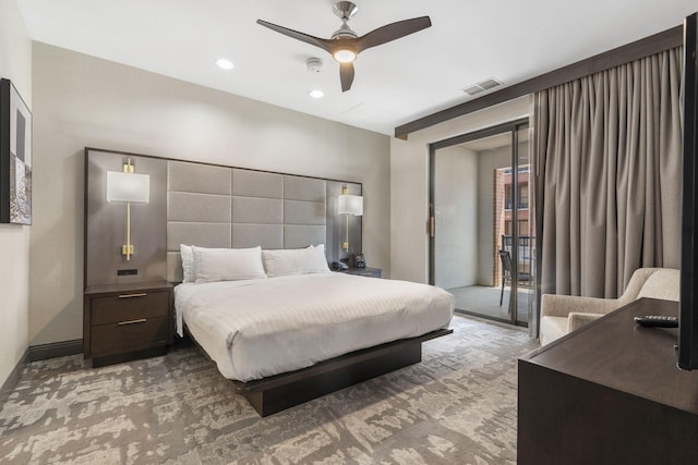 bedroom with ceiling fan and carpet flooring