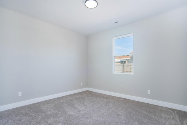 spare room featuring carpet flooring