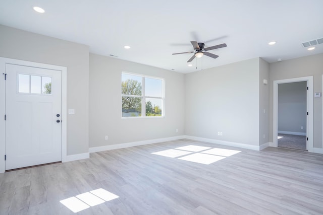 foyer with light hardwood / wood-style flooring and ceiling fan