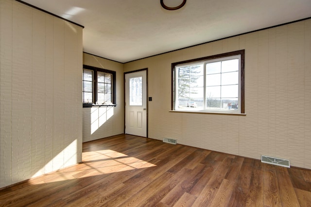 foyer entrance with wood-type flooring