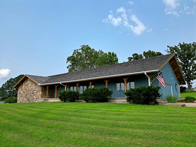 ranch-style house featuring a front lawn