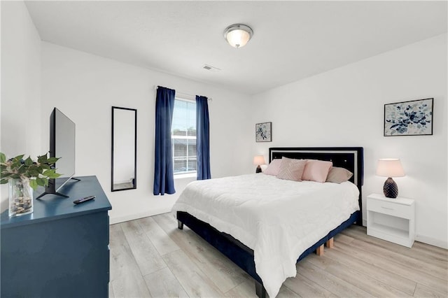 bedroom featuring light hardwood / wood-style flooring