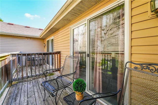 wooden balcony featuring a wooden deck