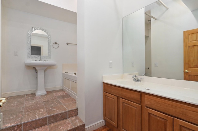 bathroom with a tub and sink