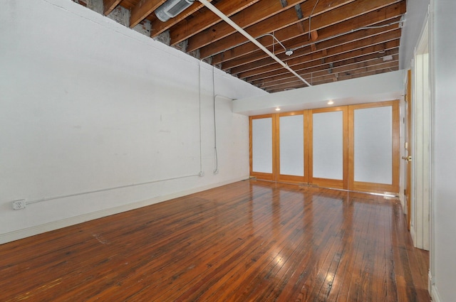 basement featuring hardwood / wood-style flooring