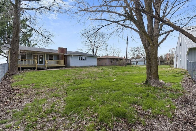 view of yard with a wooden deck