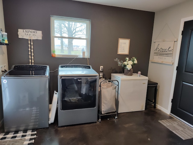 laundry area with washer and dryer