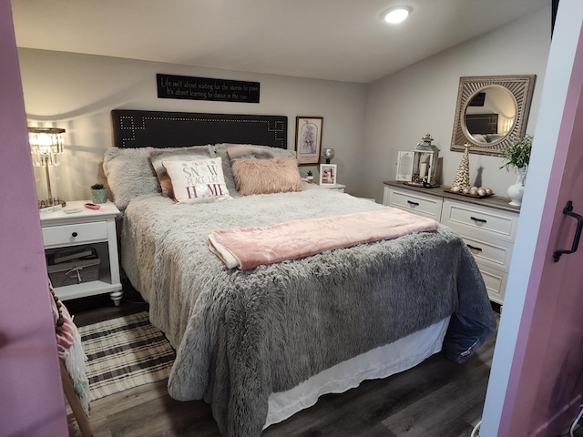 bedroom featuring dark hardwood / wood-style floors