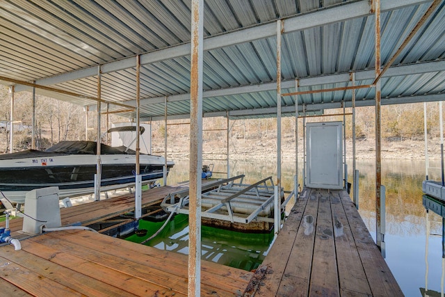 dock area with a water view