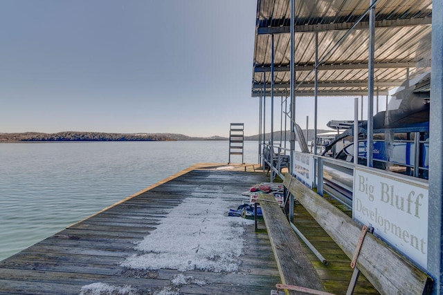 view of dock with a water view