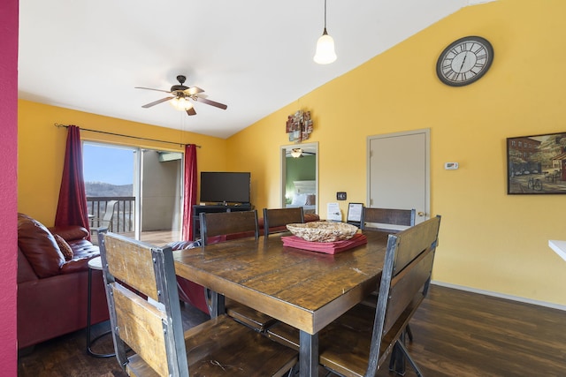 dining area with ceiling fan, vaulted ceiling, and dark hardwood / wood-style flooring