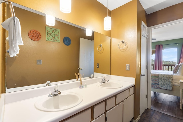 bathroom featuring vanity and hardwood / wood-style floors