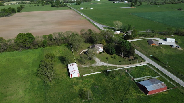 birds eye view of property featuring a rural view