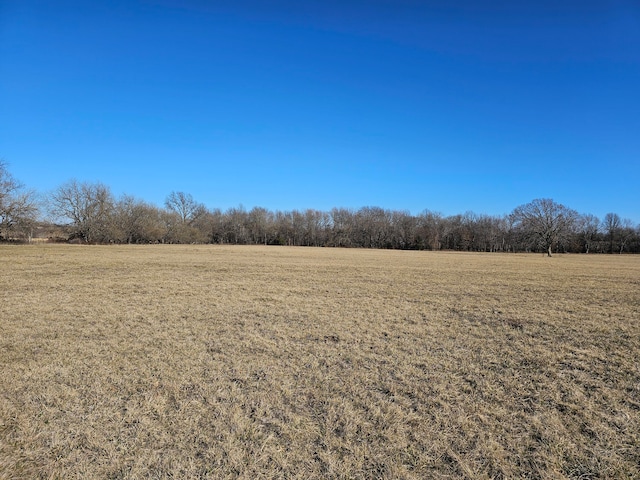 exterior space with a rural view