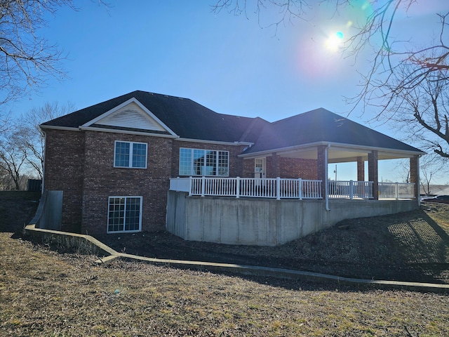 back of property with a gazebo