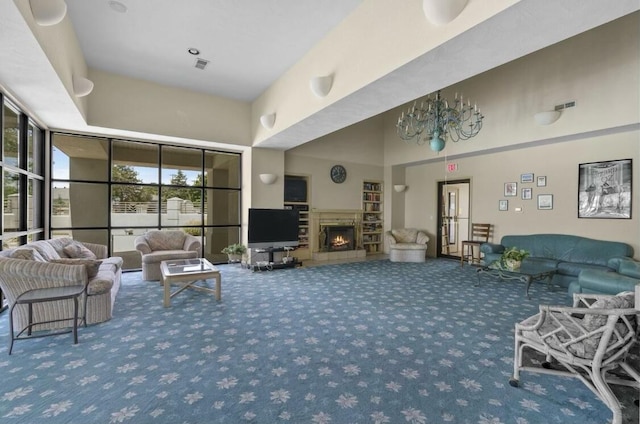 living room with a high ceiling and carpet