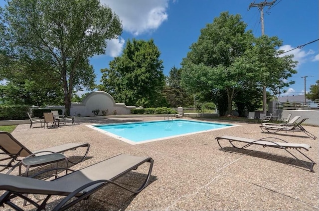 view of pool featuring a patio area