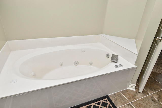 bathroom with tiled bath