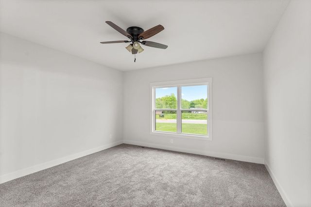 carpeted empty room with ceiling fan