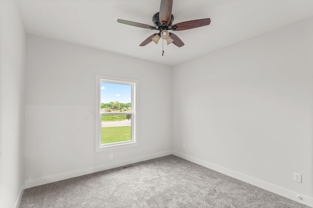 carpeted empty room with ceiling fan