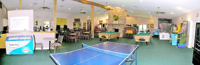 game room with high vaulted ceiling, ceiling fan, and carpet floors