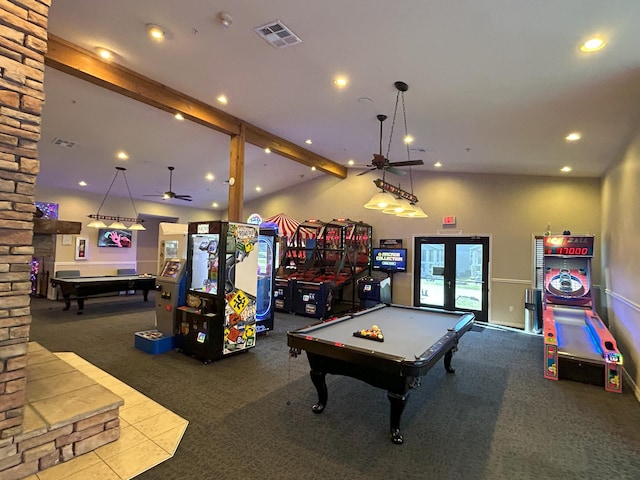 playroom with ceiling fan, a stone fireplace, french doors, pool table, and carpet flooring