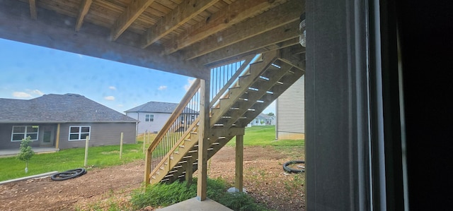 exterior space with a yard and a wooden deck