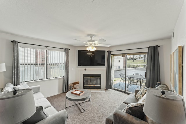 living room featuring light colored carpet and ceiling fan