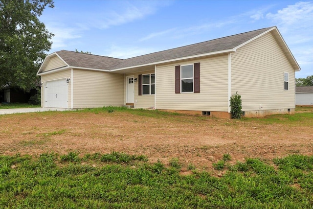 ranch-style home with a garage